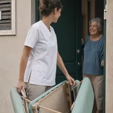 Physiotherapist arriving at a patient's home